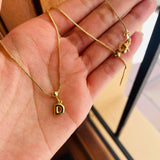 Collar letra D globo