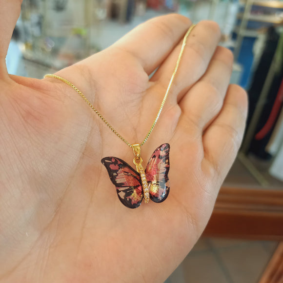 Collar mariposa transformación rosa