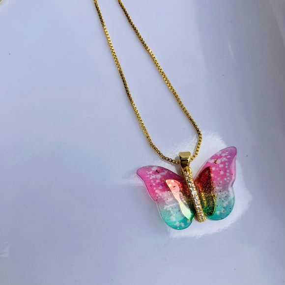 Collar mariposa transformación rosa/menta