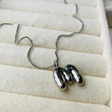collar letra M bubble