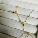 Collar Cruz perla Glam