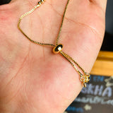 Pulsera mariquita dorada