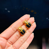 Topos escarabajo negro