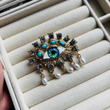 Prendedor ojo divino