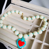 Collar Amor celeste beige