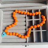 Collar naranja corazón turco