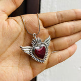 Collar corazon alas plateado