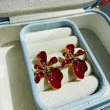 Topos lirio rojo