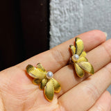 Topo media flor perla