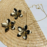 Set collar + topos maxi flor