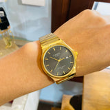 Reloj casio redondo dorado/negro