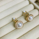 Topos clip perla dorado