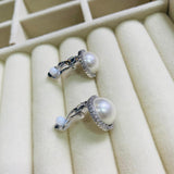 Topos clip perla plateado