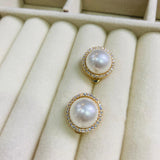 Topos clip perla dorado