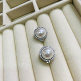 Topos clip perla plateado