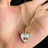 Collar corazon ojo