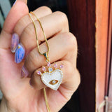 Collar corazon ojo
