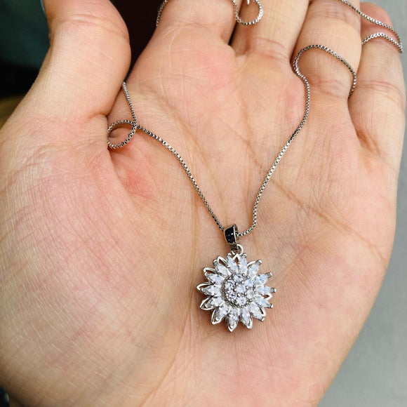 Collar girasol giratorio plateado