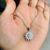 Collar girasol giratorio plateado