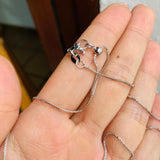 Collar girasol giratorio plateado