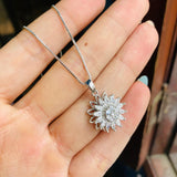 Collar girasol giratorio plateado