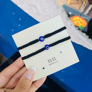 Pulsera Ojo turco negra tejida x2